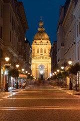 Fototapeta na wymiar Budapest historical city center, picturesque streets to Saint Stephen basilica in Budapest, Hungary night time blue hour. 