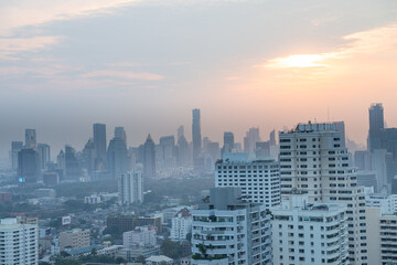 Fototapeta premium Bangkok Cityscape Business Administrative center view from rooftop during sunset. Picture taken on Feb 28, 2021 