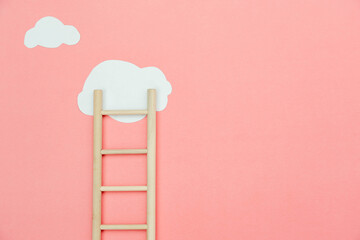Top view wooden ladder with cloud same as step stair on  pink paper