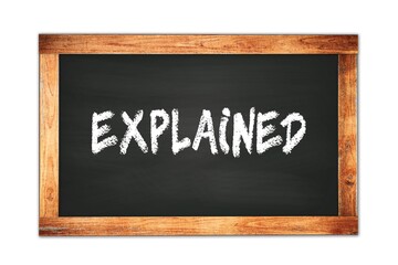 Obraz premium EXPLAINED text written on wooden frame school blackboard.