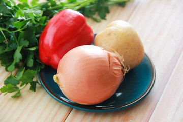 natural fresh vegetables, red peppers, potatoes and onions
