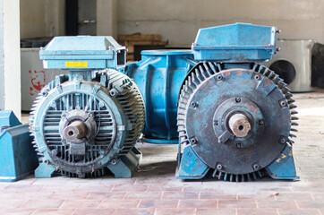 Industry. Damaged high power motors without belt pulleys.