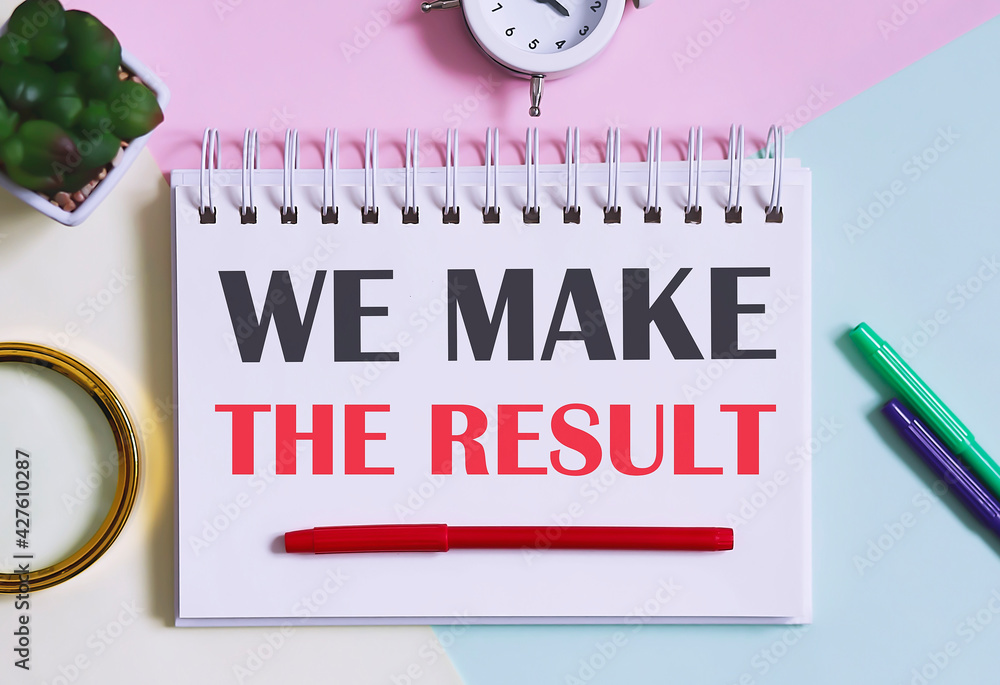Aufkleber we make the result text written on a notebook with pencils, magnifier