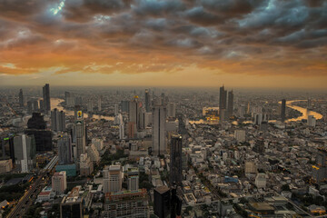 Bangkok city skyline with sunset over the Chao Phraya river