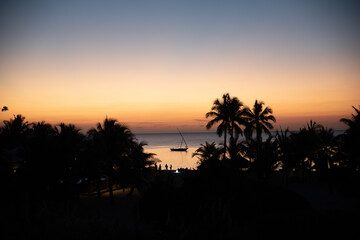 tropical island at the sunset