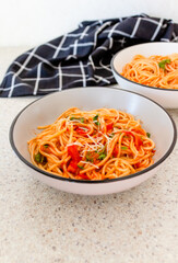 spaghetti with vegetables and cheese