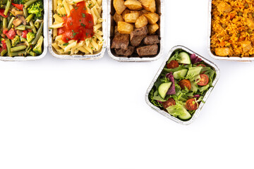 Take away healthy food in foil boxes isolated on white background. Top view. Copy space