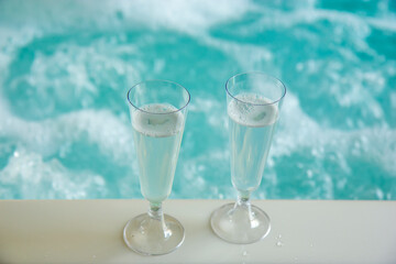 Champagne glasses on the hot tub