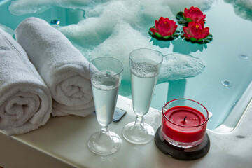 Fototapeta na wymiar Champagne glasses on the hot tub