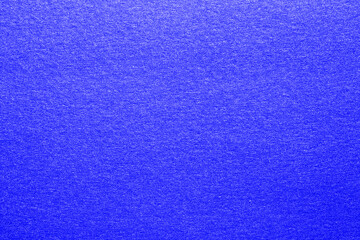 Closeup of a bright seamless steel blue glitter sparkling metal paper texture for christmas gift design, Web, card with shiny surface and copy space for text. Macro.