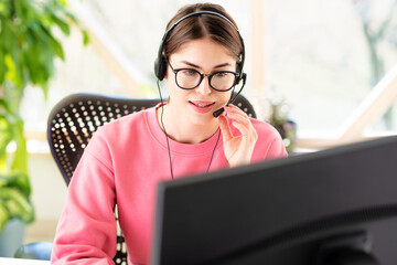 Shot of call center agent operator businesswoman working from home