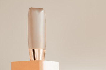Liquid concealer packaging template mock up. Foundation bottle mockup on podium pedestal, beige...