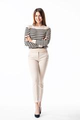 Confident young businesswoman full length studio shot