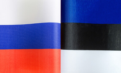 fragments of the national flags of Russia and Estonia close-up