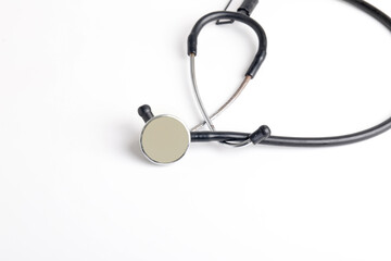 Black stethoscope on white background
