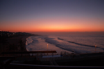 Fototapeta na wymiar Sunrise over the sea, Margate beach South Africa