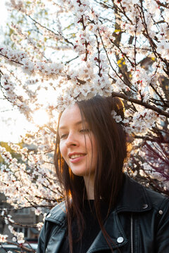 photo of a girl near the cherry blossoms