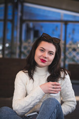Outdoor lifestyle portrait of pretty girl