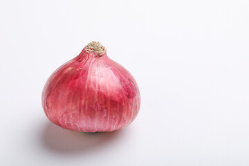Red onion on white background.