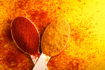 turmeric and chilly powder in spoon