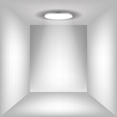 white wall on which shines a flashligh.