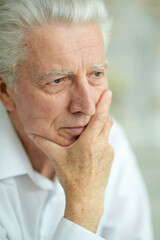 portrait of sad thinking  senior man