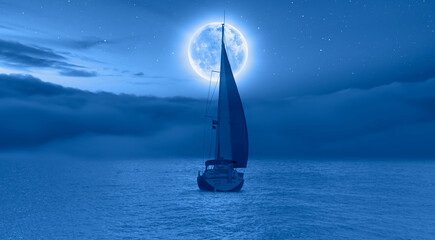 Lone yacht with Super Full Moon 