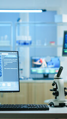 Empty laboratory modernly equipped with nobody in it, prepared for pharmaceutical innovation using high tech and microbiology tools for scientific research. Vaccine development against covid19 virus.