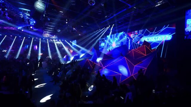 Fish eye effect for the preparations of the stage for the concert. Stock footage. People working with the stage for the event or performance.