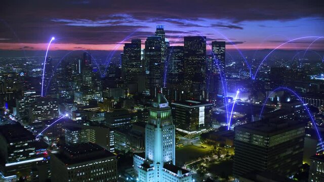Smart and futuristic metropolis at dusk. Blue holographic lines connecting Los Angeles. Arch network animation. Shot in 8K. Famous skyscrapers in downtown.