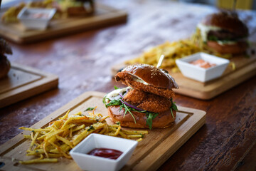 tasty delicious home made burgers with french fries