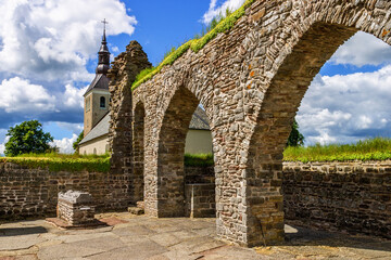 Arches in  Gudhem monastery ruins with church