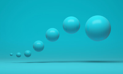 A group of floating turquoise spheres arranged in a curved line on a turquoise background. 3d rendering