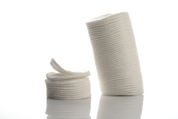 White cotton makeup removal pads isolated on white.