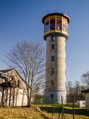 Renovated Aizpute city water tower with a viewing platform.