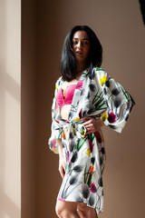 Portrait of beautiful glamor brunette teenager model in summer hipster clothes