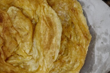 Indian naan bread homemade on paper background India food