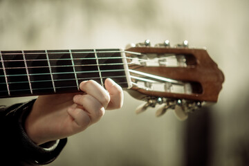 child playing guitar close-up of hands