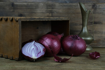 close-up of red onion, whole onions and cut, the concept of ingredients for cooking, vitamins for health, home herbal medicine