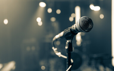 Close up microphone on blurred background with bokeh.