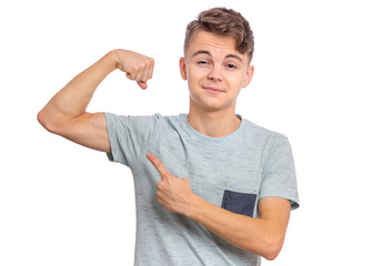 Portrait of funny teen boy raised his hand and shows biceps, isolated on white background. Handsome teenage young boy shows biceps. - 427651457