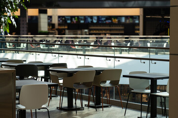 Interior of wooden table in food court shopping mall.