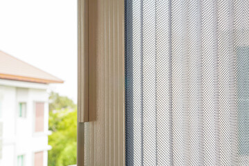 Open Retractable pleated insect screen or mosquito net that installed with window ,selective focus