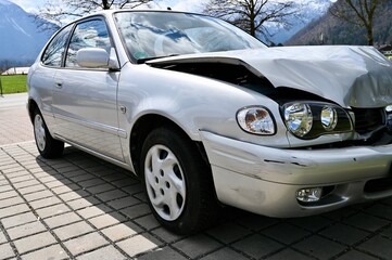 damaged hood the car after accident.