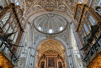 Interior view of La Mezquita Cathedral in Cordoba Spain. The cathedral was built inside of the former Great Mosque. Popular tourist destination in Spain.