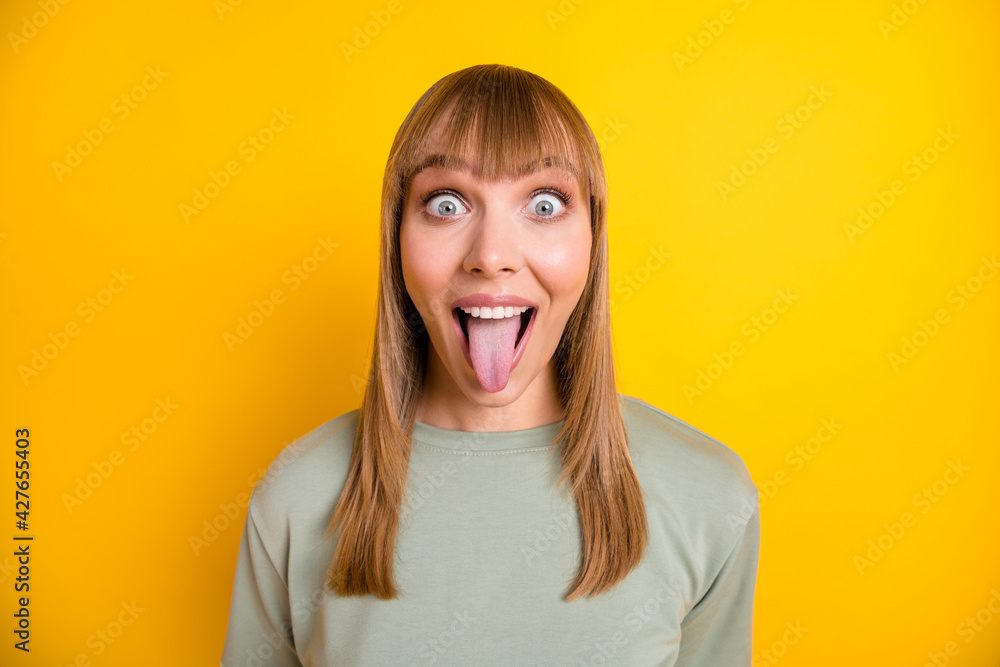 Poster close-up portrait of nice attractive foolish cheerful crazy girl teasing you having fun isolated ove