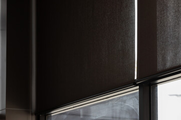 blind curtain or black blinds Roller sun protection in office.