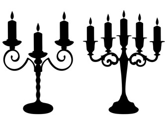 Beautiful antique candlesticks with candles included. Vector image.