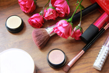 Obraz na płótnie Canvas Cosmetics, eye shadow, lip gloss, Makeup brushes