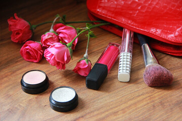 Obraz na płótnie Canvas Cosmetics, eye shadow, lip gloss, Makeup brushes